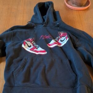 Jordan Kids Black Hoodie with Red and White Sneaker Graphic